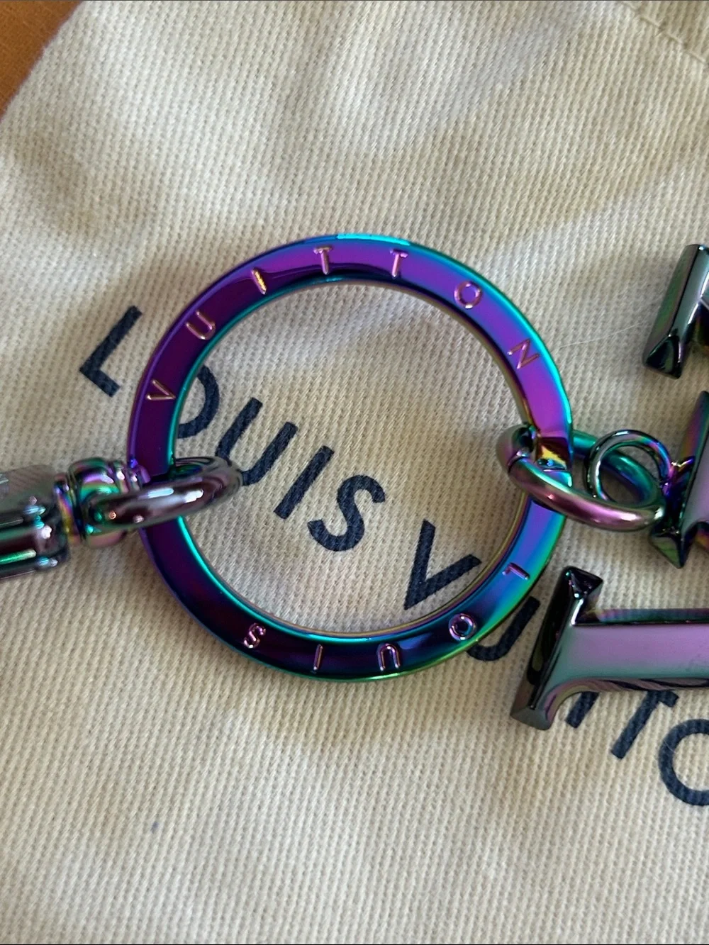 Louis Vuitton Oilslick iridescent Keychain Bag Charm M69478